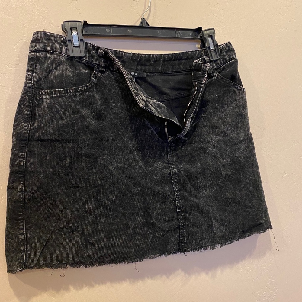 Short black denim skirt